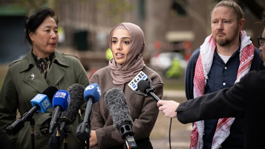 Amal Naser,, centre, with fellow Birdge protest organiser and Palestinian Action Group member Josh Lees, and NSW Green Jenny Leong.
