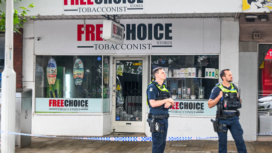 Police outside the tobacco shop in Pier Street, Altona on Thursday.