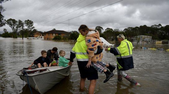 Suzette Turner and Grant Berry await the arrival of their grandkids who have been rescued from Shanes Park.
