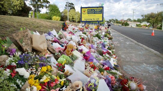 Tributes left at Hillcrest Primary School following the death of five children in a jumping castle incident.