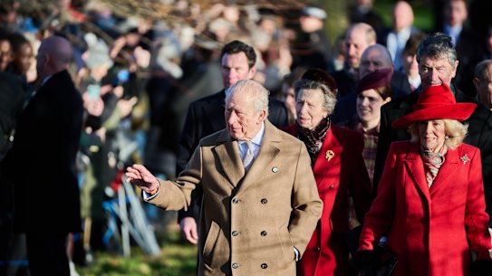 King Charles and Queen Camilla wave to the public at Sandringham Estate on Christmas Day.