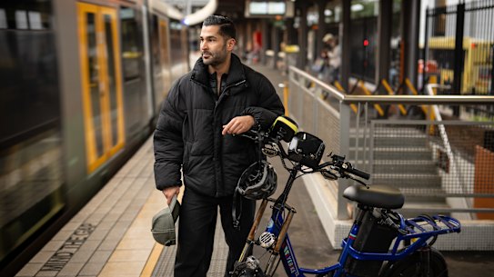 Saam Taghavi at Parramatta station with his e-bike, which he soon may not being able to take on the train.