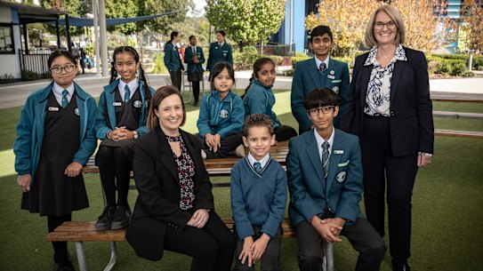 Catherine Bust, head of junior school, and Katrina New, head of senior school, with students at Marsden Park Anglican College.