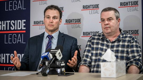 Abuse victim Adam Kneale, right, and his lawyer, Michael Magazanik.