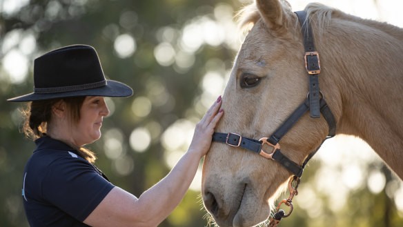 Elizabeth Milinkovic, owner and founder of Sydney Equine Assisted Learning, uses horses to help address mental health and personal development needs. Elizabeth, pictured with Mojo the nine-year-old stock horse on her property in Blaxlands Ridge, NSW.