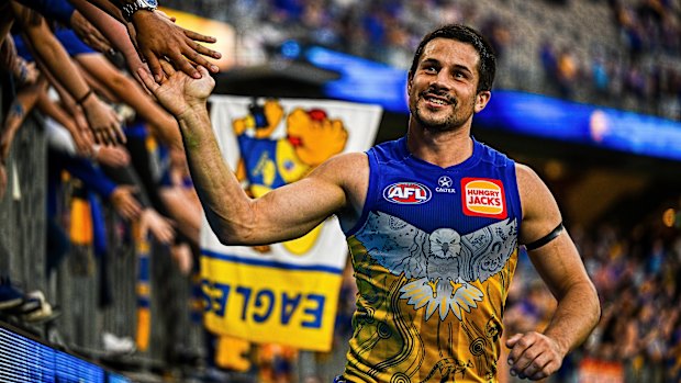 West Coast’s Liam Duggan basks in the adoration of Eagles fans after the club’s first win of the year.