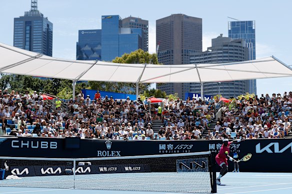 Frances Tiafoe plays in front of a packed crowd on 1573 Arena.