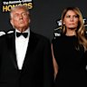 President Donald Trump and first lady Melania Trump, walk the red carpet before the 48th Kennedy Center Honors, Sunday, Dec. 7, 2025, at the John F. Kennedy Center for the Performing Arts in Washington.