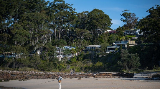Houses overlooking Narrawallee Beach have sold for up to $12 million.