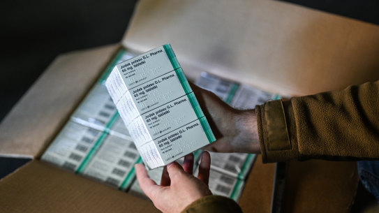 Fears for the region: a firefighter opens a box full of Iodine tablets in Poland.