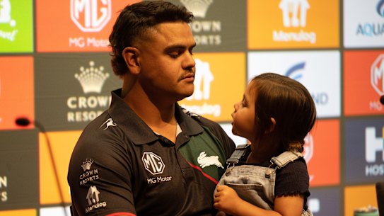 Latrell Mitchell with his daughter Aleena.
