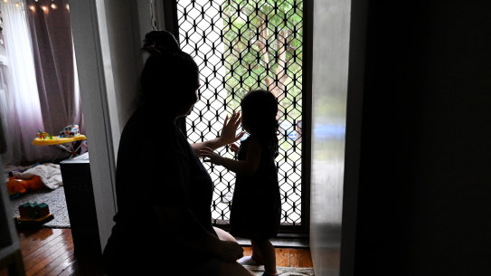 Naomi with her daughter, who was born in Australia but is - like the rest of her family - living in community detention with no end in sight.