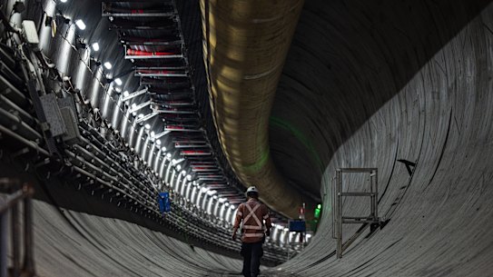 A worker walks through one of the twin tunnels under Rosehill Racecourse near Parramatta.