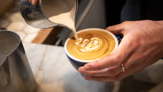 A magic coffee is poured at Bowery to Williamsburg cafe.