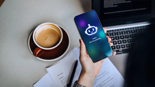 Overhead shot of businesswoman using an AI chatbot virtual assistance app