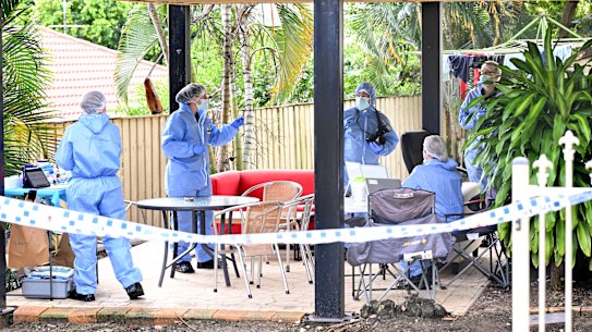 Forensic police at the Springfield Lakes home on Saturday.
