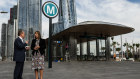Sydney Metro chief executive Peter Regan and Transport Minister Jo Haylen in front of the entrance to the Barangaroo metro station. 