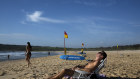 Sydneysiders seek to beat the heat at Maroubra beach on the last day of summer.