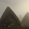 The Sydney Opera House surrounded by fog which has caused ferries to be cancelled. 
