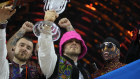 Members of the Kalush Orchestra from Ukraine celebrate after winning the Grand Final of the Eurovision Song Contest in Turin, Italy.