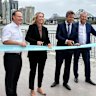 Lord Mayor Adrian Schrinner was among the group officially reopening the Riverwalk on Tuesday.