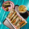 Garlic-buttered bread sends the flavour of this club sandwich soaring.