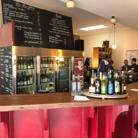 The bar sells local cheese and wine.