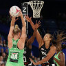 PERTH, AUSTRALIA - MAY 08: Geva Mentor of the Magpies attempts to block a shot by Sasha Glasgow of the Fever during the round eight Super Netball match between West Coast Fever and Collingwood Magpies at RAC Arena, on May 08, 2022, in Perth, Australia. (Photo by Paul Kane/Getty Images)