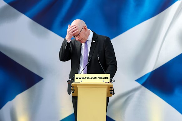 First Minister John Swinney reacts as he delivers a speech on Scotland’s future at the Blue Drill Hall in Edinburgh.