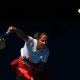 MELBOURNE, AUSTRALIA - JANUARY 23: Madison Keys of United States serves in her fourth round singles match against Paula Badosa of Spain during day seven of the 2022 Australian Open at Melbourne Park on January 23, 2022 in Melbourne, Australia. (Photo by Clive Brunskill/Getty Images)
