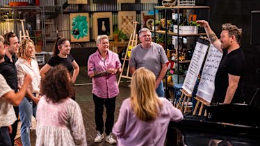 Songwriter Eddie Perfect helps <i>Space 22</i> participants including Vivienne and Ray write their own song.