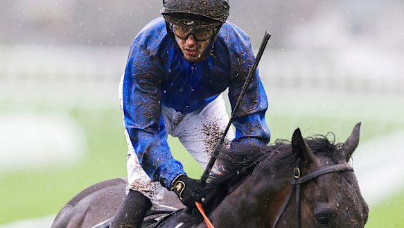 Brenton Avdulla rides through the mud at Royal Randwick on Saturday.