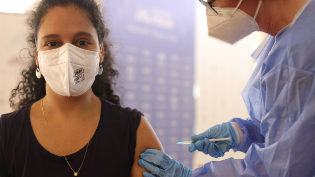 A resident in Germany receives the AstraZeneca vaccine. 