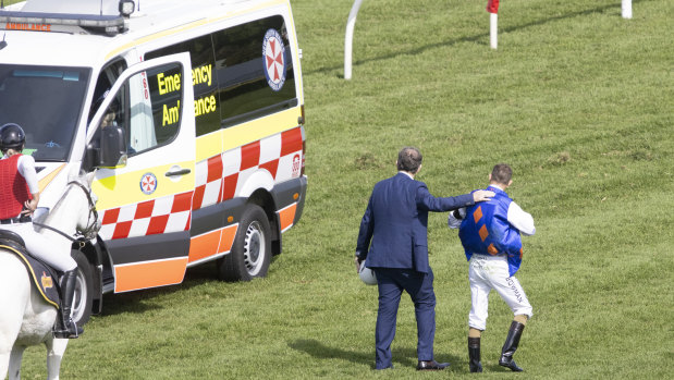 Hugh Bowman back on his feet after falling on board Rothenburg in the opening race at Randwick. Rothenburg was euthanised.  