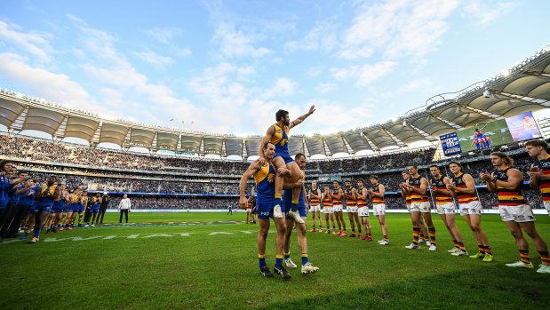 Eagle Josh Kennedy is chaired off after his final game Sunday, a 16-point loss to the Crows.