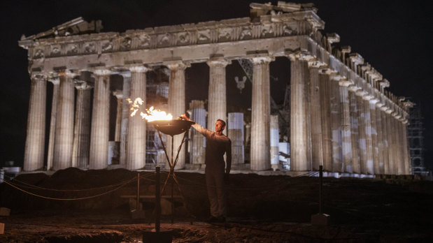 The Olympic flame on its way from Greece to Paris.