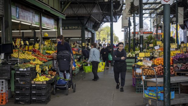 The fruit and vegetable stalls at the market.