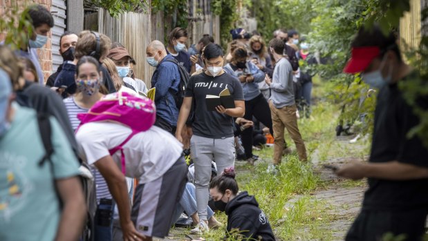 The queue on Tuesday for COVID-19 testing extended into an alleyway at a St Kilda east site, which was at capacity and forced to close half an hour before it was meant to open. 