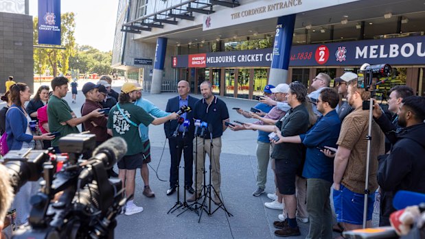 Melbourne Cricket Club chief executive Stuart Fox and head curator Matthew Page front the media at the MCG on what should have been day three of the Test.