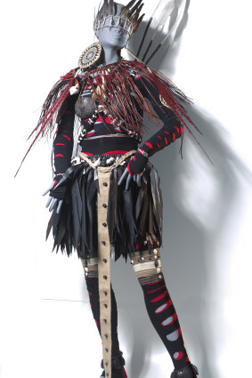 Pacific Sisters’ 21st sentry cyber sister, 1997, Tapa (bark cloth), feathers, bone, harakeke (New Zealand flax), nylon, shells, seeds, coconut shell, videotape, plastic.
