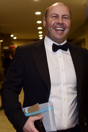 Federal Treasurer Josh Frydenberg arrives for John Howard's birthday.