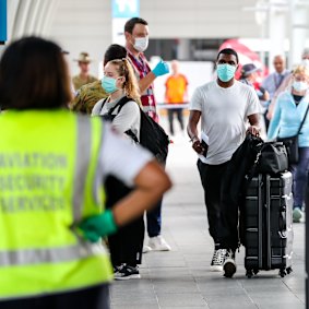 Buses taking people away for quarantine after they have arrived home from overseas. 