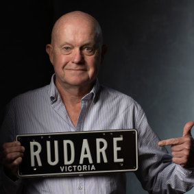 A bald-headed reporter. John Silvester with Mokbel’s number plates.