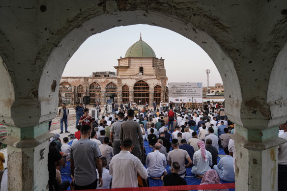 The al-Nuri mosque is rising from the rubble.