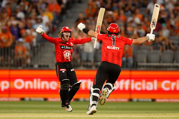 Ollie Peake with Sam Elliott after hitting the winning runs against the Scorchers.