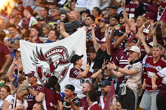 Sea Eagles fans celebrate at Suncorp Stadium.