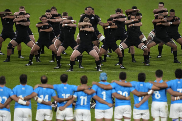 New Zealand’s players perform the haka ahead of their Pool A match against Uruguay in Lyon.
