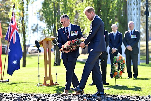 Attending a wreath laying ceremony before a private tour of the War Memorial.