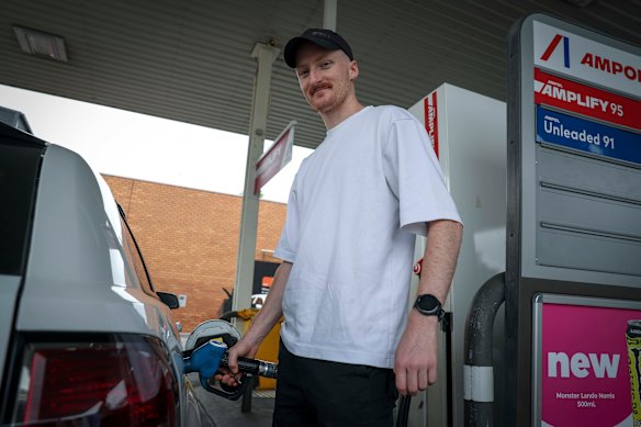 Melbourne motorist David Mathews fills up on Friday before driving to Halls Gap to compete in the Stawell Gift.