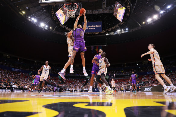 Xavier Cook lays up against the Taipans last month.